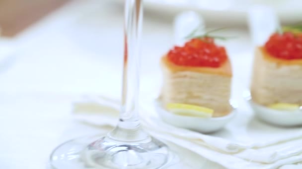 Tartlets with red caviar on white plate — Stock Footage Tartlets Red Caviar White Plate Stock Footage