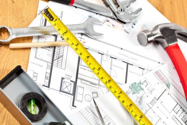 plan, ölçüm bandı ve inşaat araçları, bakım kavramı üst görünüm