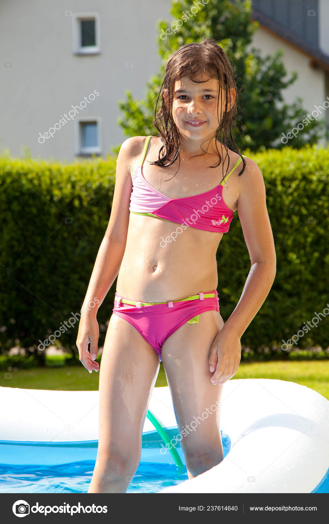 Cute Little Girl Swimming Pool Stock Photo by ©KarepaStock 237614640