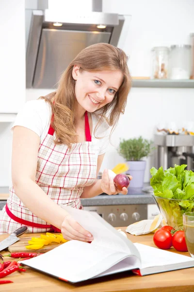 Beautiful Young Woman Apron Reading Cookbook Cooking Vegetable Salad Kitchen — Stock Photo, Image