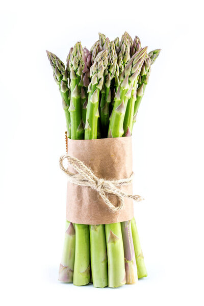 close-up view of fresh ripe healthy asparagus isolated on white background