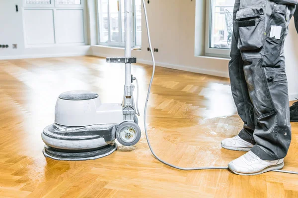 Young Man Varnishing Oak Parquet Floor Tool — Stock Photo, Image