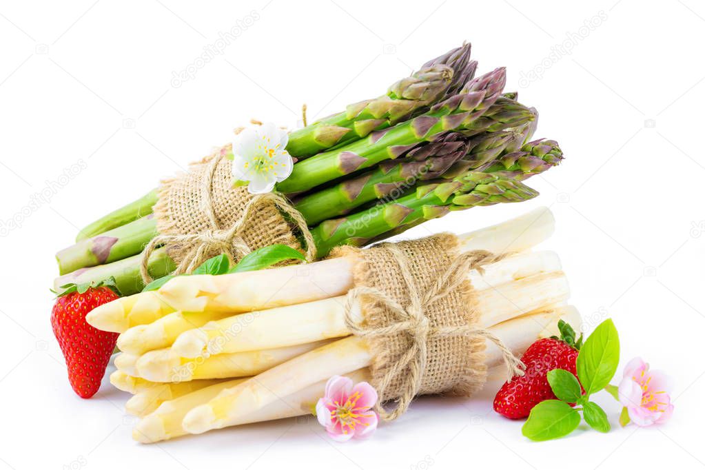 bunches of fresh white and green asparagus isolated on white  