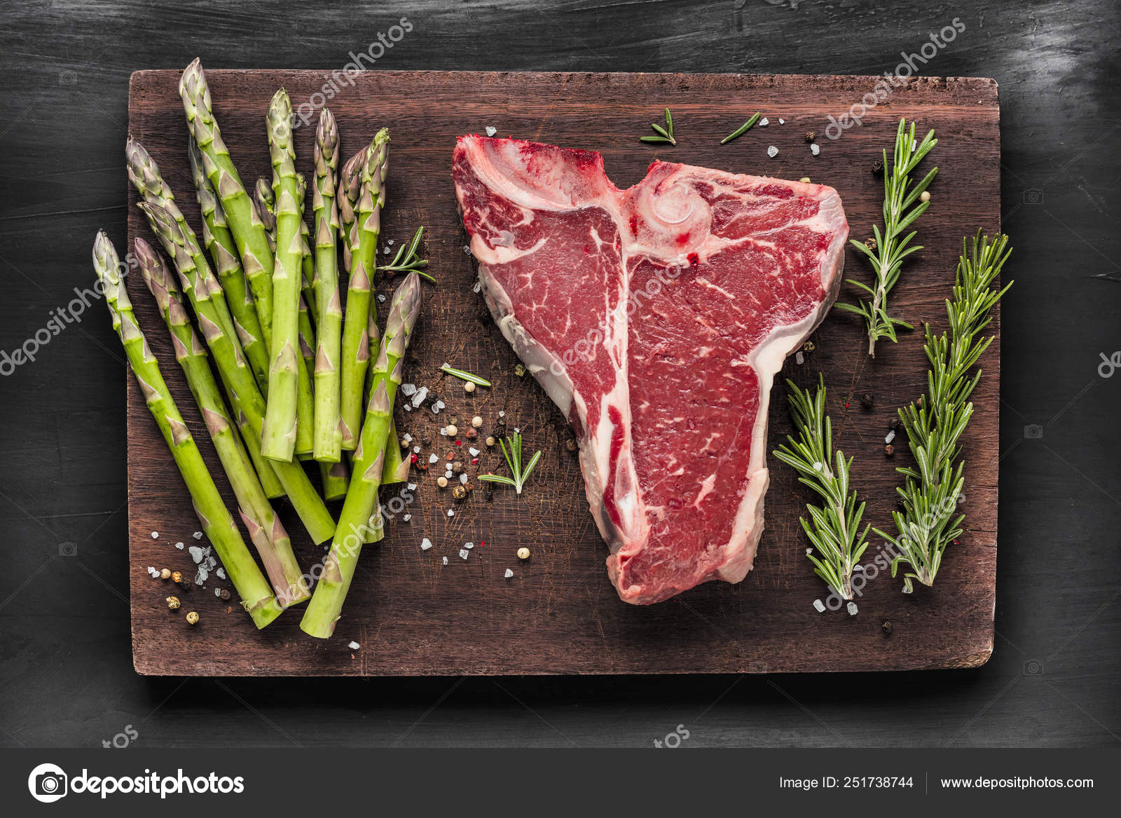 Top View Raw Barbecue Bone Steak Green Asparagus Salt Rosemary Stock