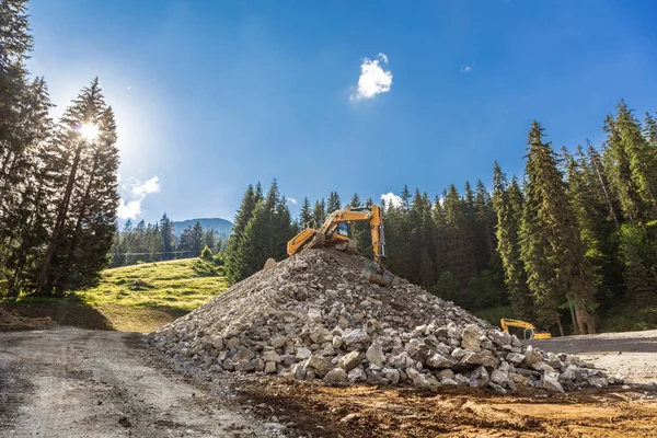 Bulldozers Pile Stones Road Mountains — 스톡 사진