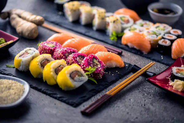 Delicious Sushi Set Slate Boards Chopsticks Ginger Soy Sauce — Stock Photo, Image