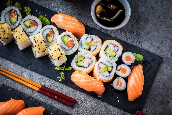 Top View Sushi Set Slate Boards Chopsticks Soy Sauce Bowl — Stock Photo, Image