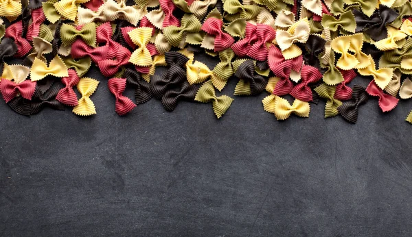 Top View Delicious Assorted Uncooked Colorful Pasta Black Background — Stock Photo, Image
