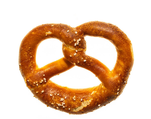 close-up view of delicious crispy salted pretzel isolated on white background
