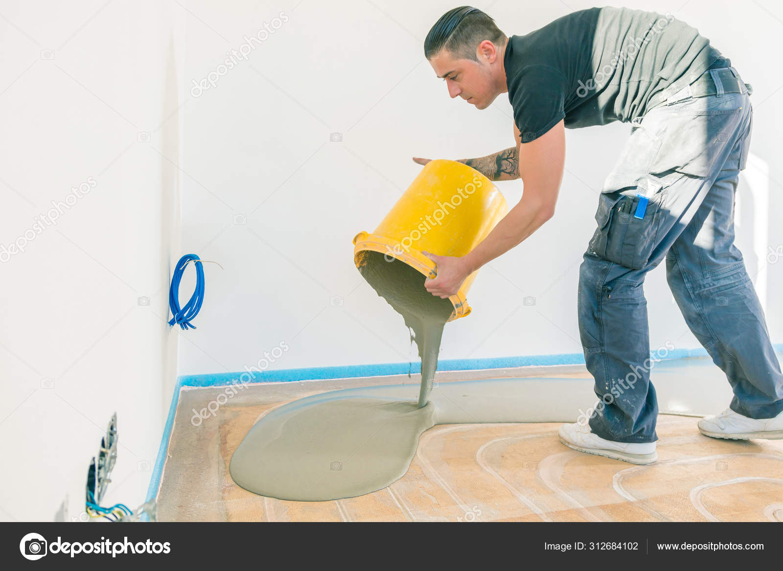 Worker Working Self Levelling Cement Mortar Floor Covering Stock