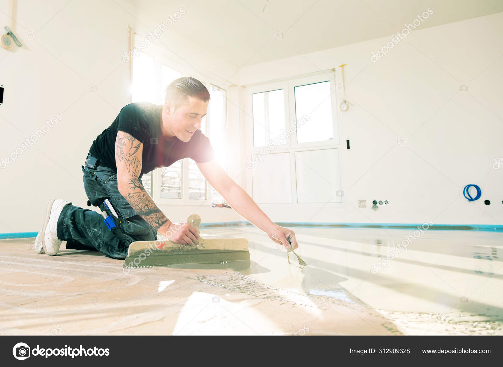 Man Working Self Levelling Cement Mortar Floor Covering Stock