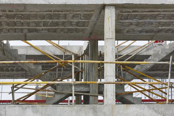 Building facade under construction. Concrete structure. Architecture. Horizontal