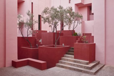 Geometric building design. The red wall, La manzanera. Calpe, Spain clipart