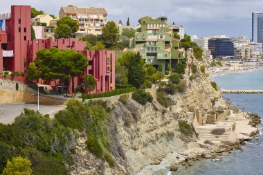 Spanish mediterranean coastline in Alicante. La manzanera. Red wall. Calpe clipart
