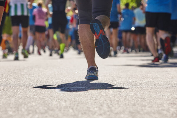 Marathon runners on the street. Healthy lifestyle. Athlete