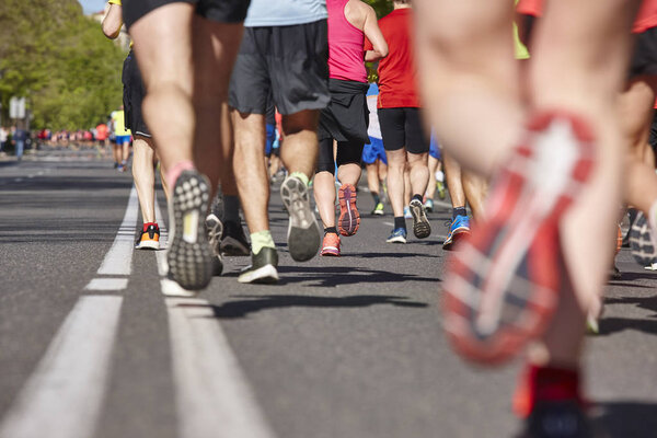 Marathon runners on the street. Healthy lifestyle. Urban athlete