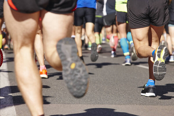 Marathon runners on the street. Healthy lifestyle. Sport activit
