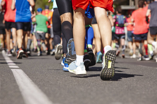 Marathon runners on the street. Healthy lifestyle. Urban athlete