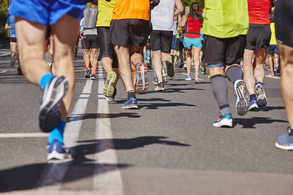 Marathon runners on the street. Healthy lifestyle. Athletes