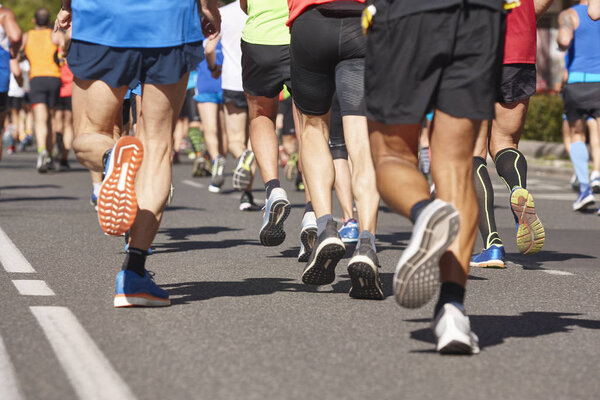 Marathon runners on the street. Healthy lifestyle. Athletes