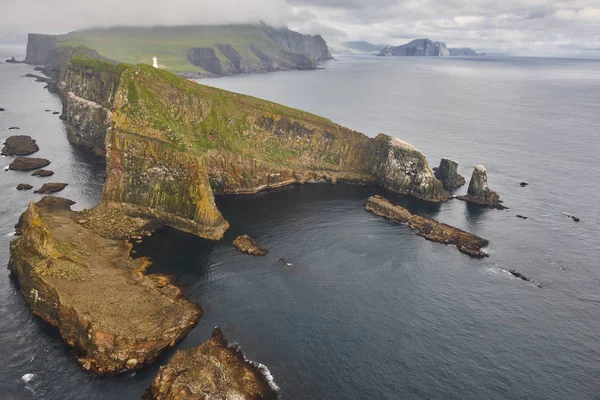 Mykines lighthouse and cliffs on Faroe islands from helicopter — Stock Photo, Image