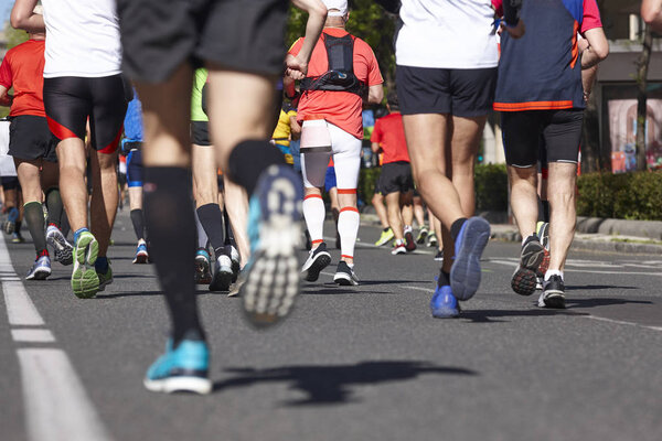 Marathon runners on the street. Healthy lifestyle. Athletes