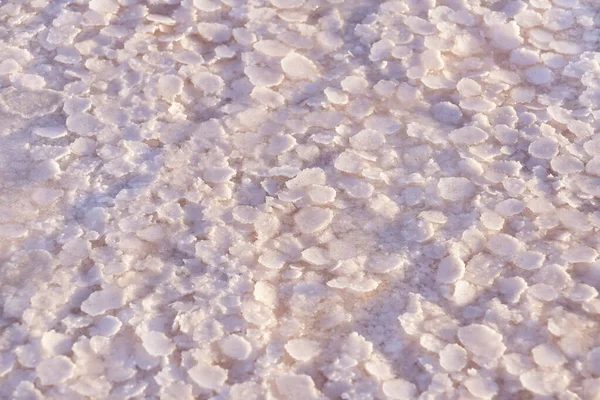 Background of flake salt in the pink lake