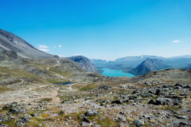 Besseggen ridge over Gjende lake in Jotunheimen National Park, Norway clipart