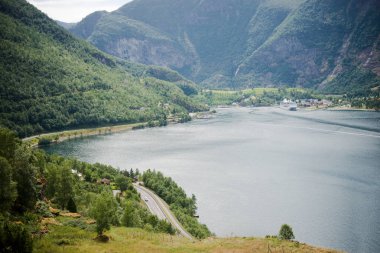 aerial view of majestic landscape with mountains and calm water at Flam village, Aurlandsfjord, (Aurlandsfjorden), Norway clipart