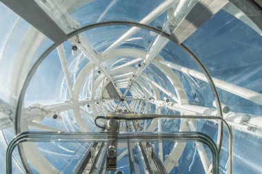 bottom view of transparent circle safety glass for building at Aker Brygge district, Oslo  clipart