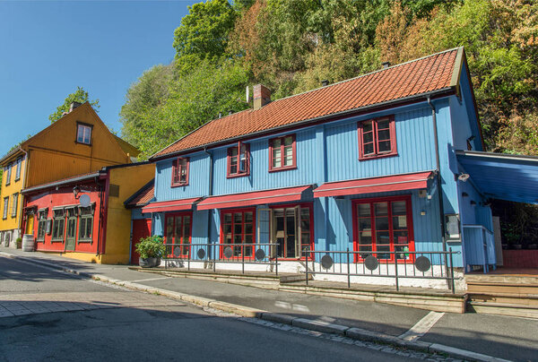 bright colorful houses on street at sunny day, oslo, norway 