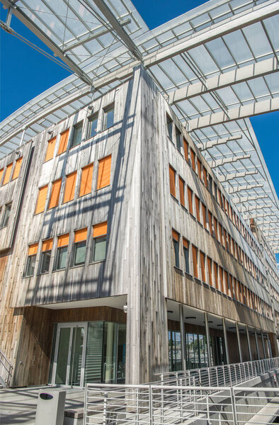 low angle view if beautiful modern building against blue sky at Aker Brygge district, Oslo  