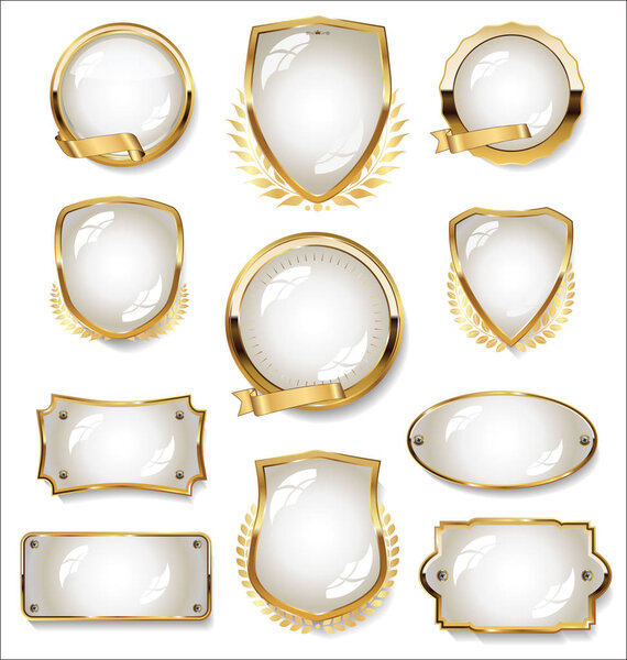 Collection of gold and white badge and labels