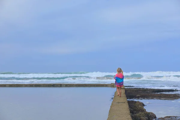 There is a lovely tide pool on the beach at Reebok in South Africa. Our grand daughter enjoyed it very much to walk alone around the pool.