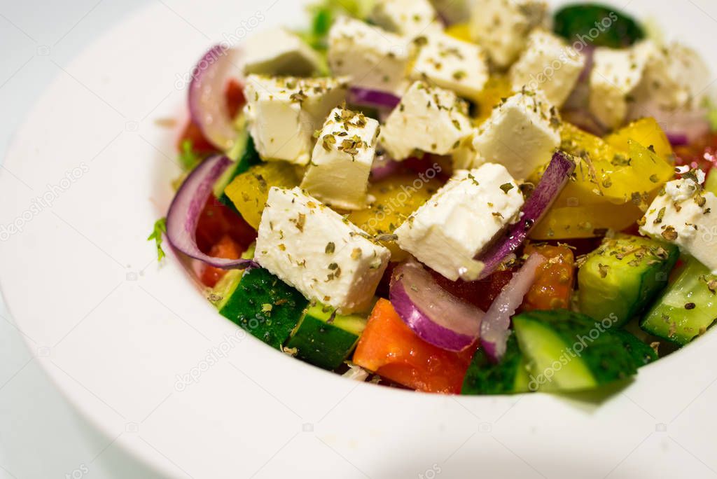 fresh salad with feta cheese and olives