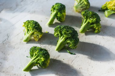 fresh healthy broccoli on a light background
