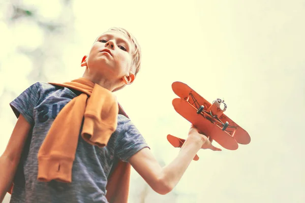 Handsome Boy Playing Yellow Toy Airplane Outdoors Dreams Traveling — Stock Photo, Image