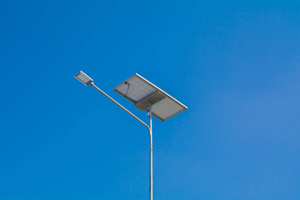 LED street light with solar cell on clear sky, close seup view
.