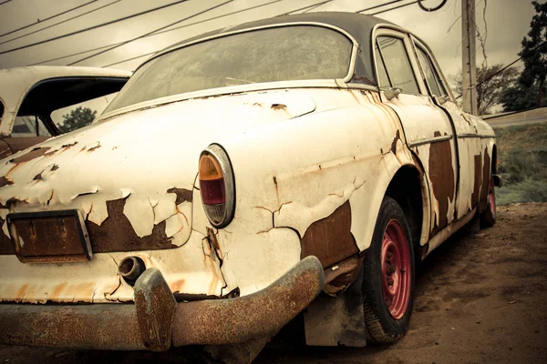 Cemetery Car, Abandoned old car in garage. retro and vintage sty — Stock Photo, Image