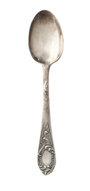 Beyaza izole edilmiş eski gümüş çay kaşığı manzarası