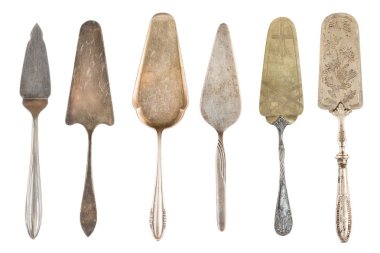 6 vintage metal antika pasta kürek beyaz bir arka plan üzerinde izole. Retro gümüş.
