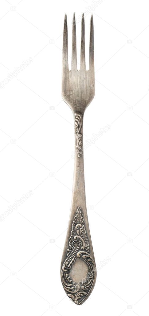 Top view of beautiful old silver fork isolated on white background