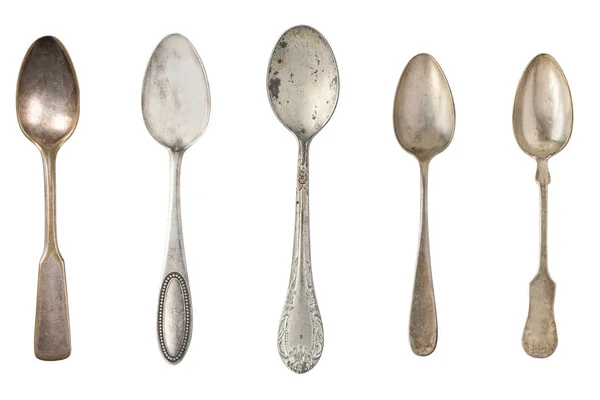 Vintage metal antique tea spoons isolated on a white background. — Stock Photo, Image