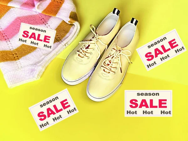 hot season sale sneakers and jumper on yellow pink   background shoes and clothes  for women summer season fashion trend sport and relaxing time