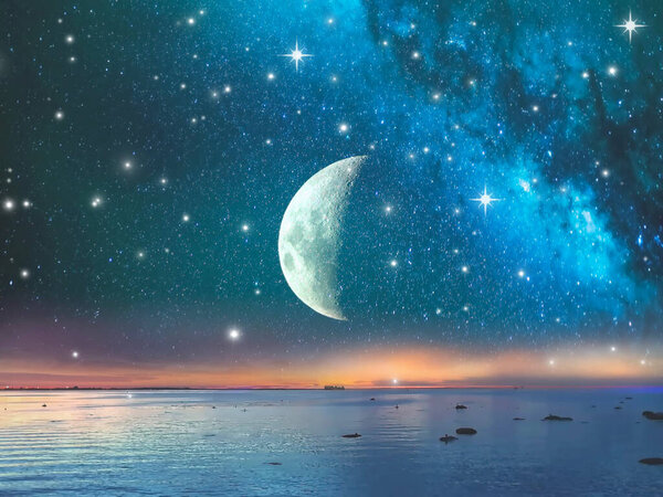 Tropical moon on starry night sky at night blue dark universe cosmic bright seascape background travel holiday
