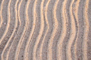 Kumsaldaki çizgiler.