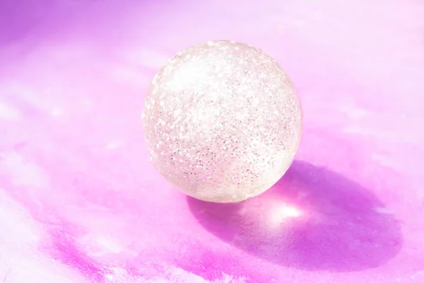 sparkles pembe bir arka plan üzerinde topla