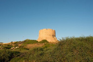 Tower Torre Aragonese on Sunset in Santa Teresa di Gallura. Sard clipart