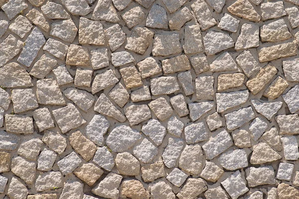 Textura de um muro de pedra. Castelo velho Parede de pedra Fundo . — Fotografia de Stock