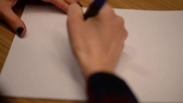 Young Girl Writes Word Paris White Sheet Paper — 图库视频影像